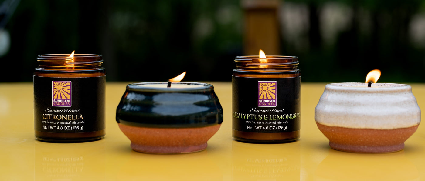 Amber Glass Jar & Ceramic Vessel araomtherapy candles outside.