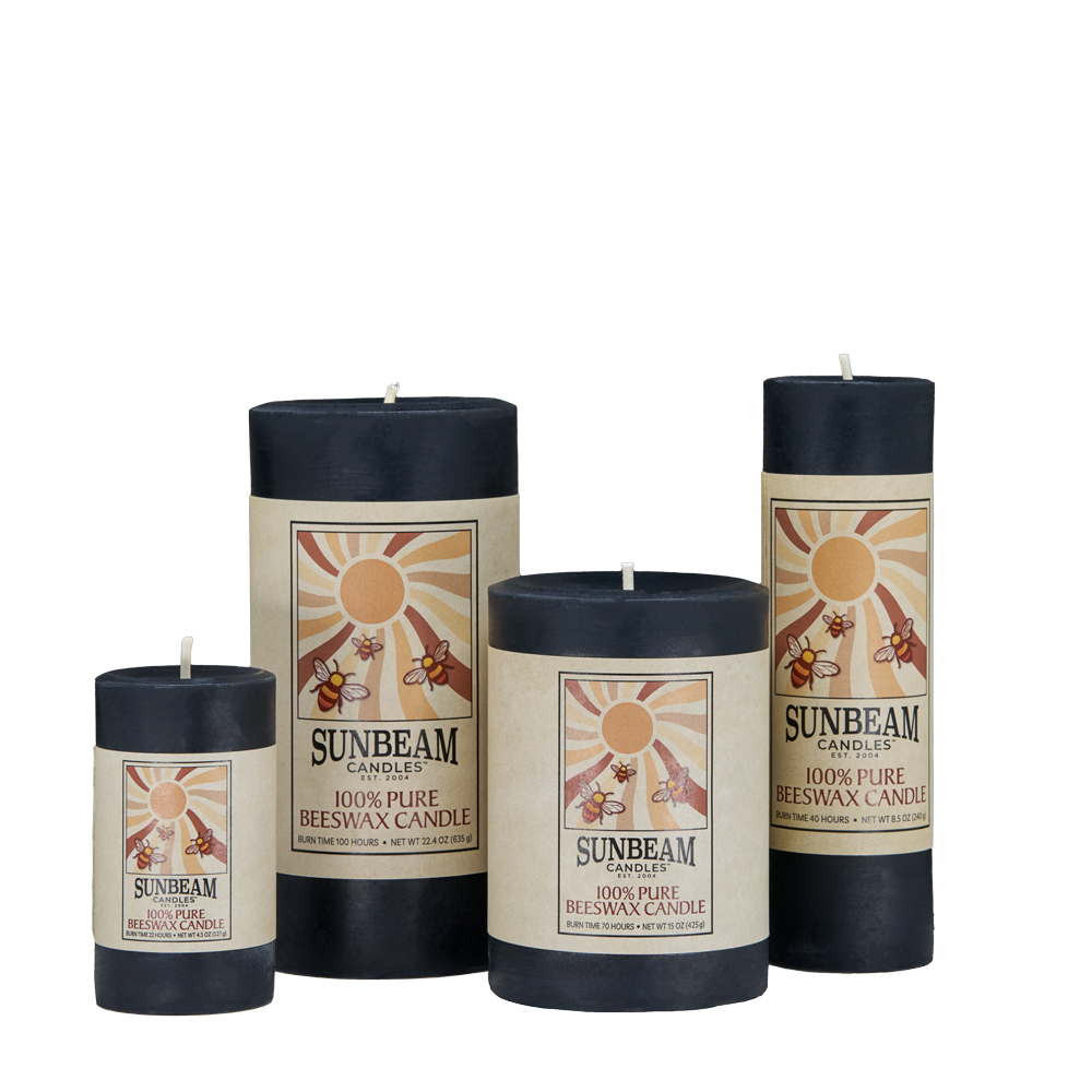 Four Sunbeam Candles Smooth Black Beeswax Pillars with a white background.
