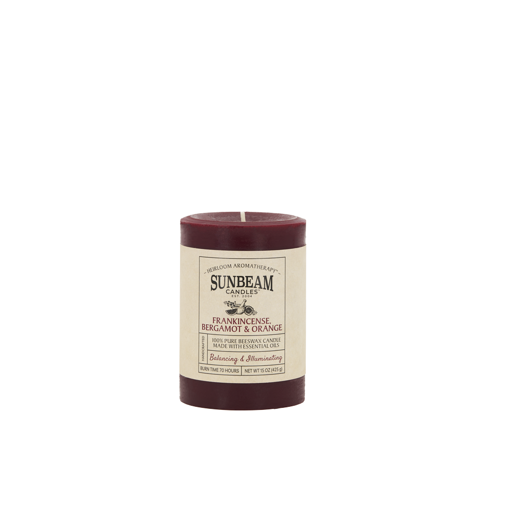 Sunbeam Candles pure burgundy Beeswax Frankincense Bergamot & Orange 3"x4.25" pillar candle on a white background
