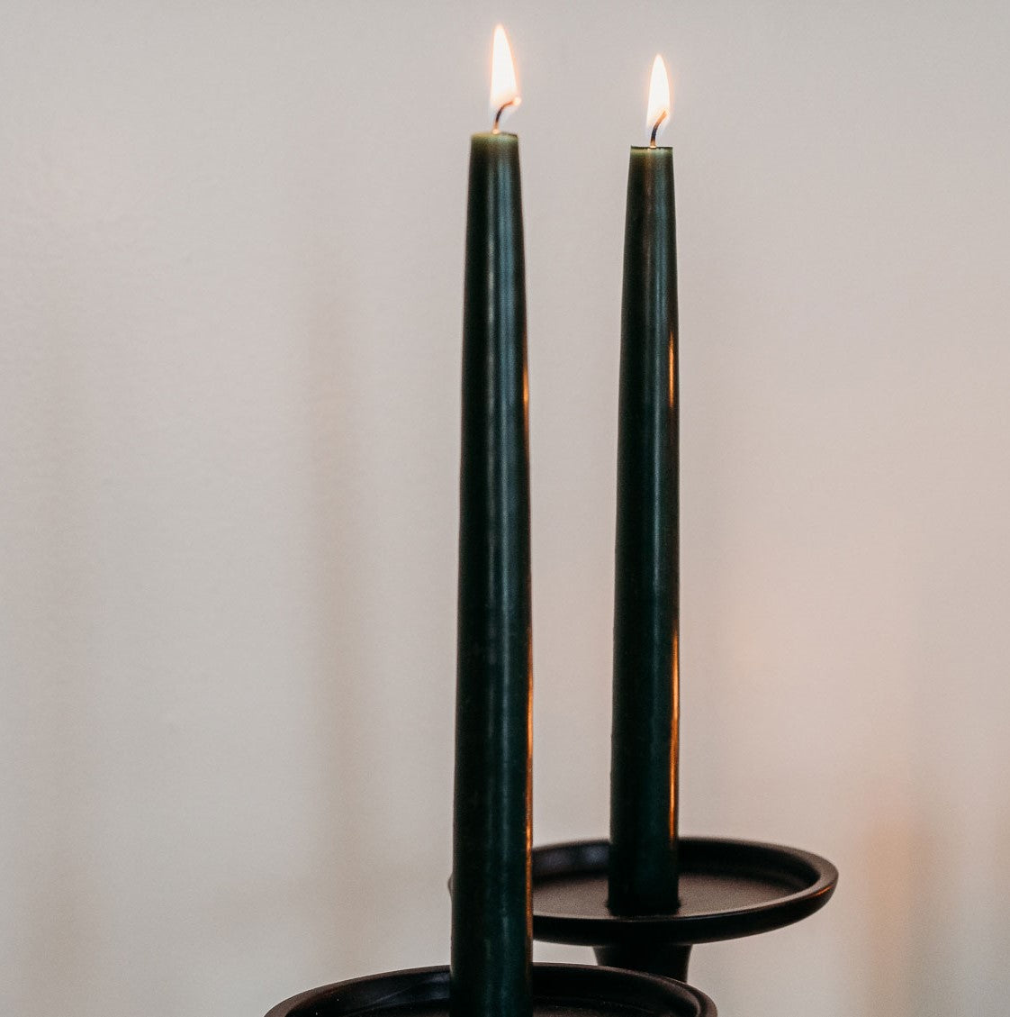 Green taper pair lit lifestyle