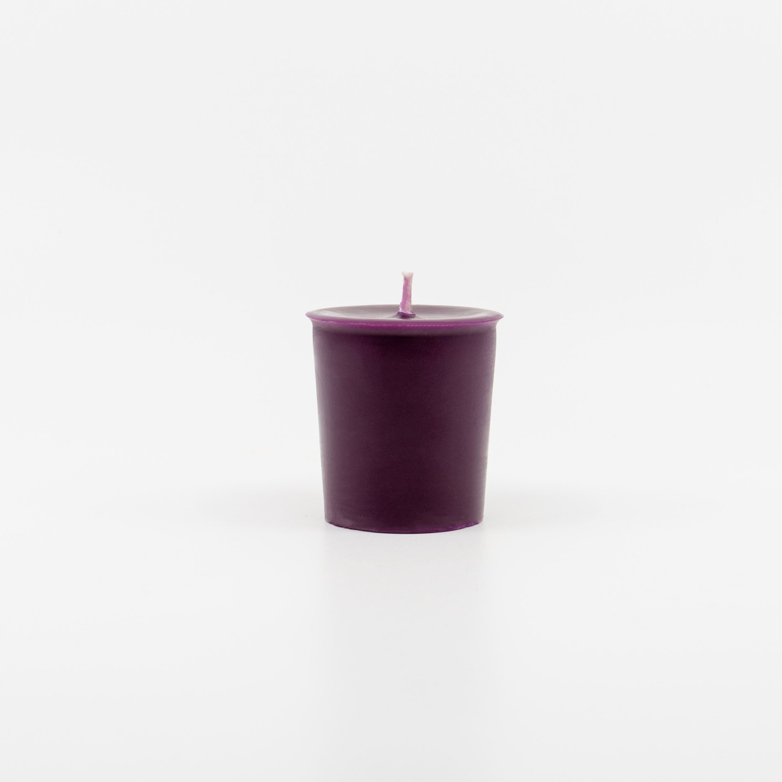 Sunbeam Candles purple Pure Beeswax Lavender & Sage single votive candle on a white background