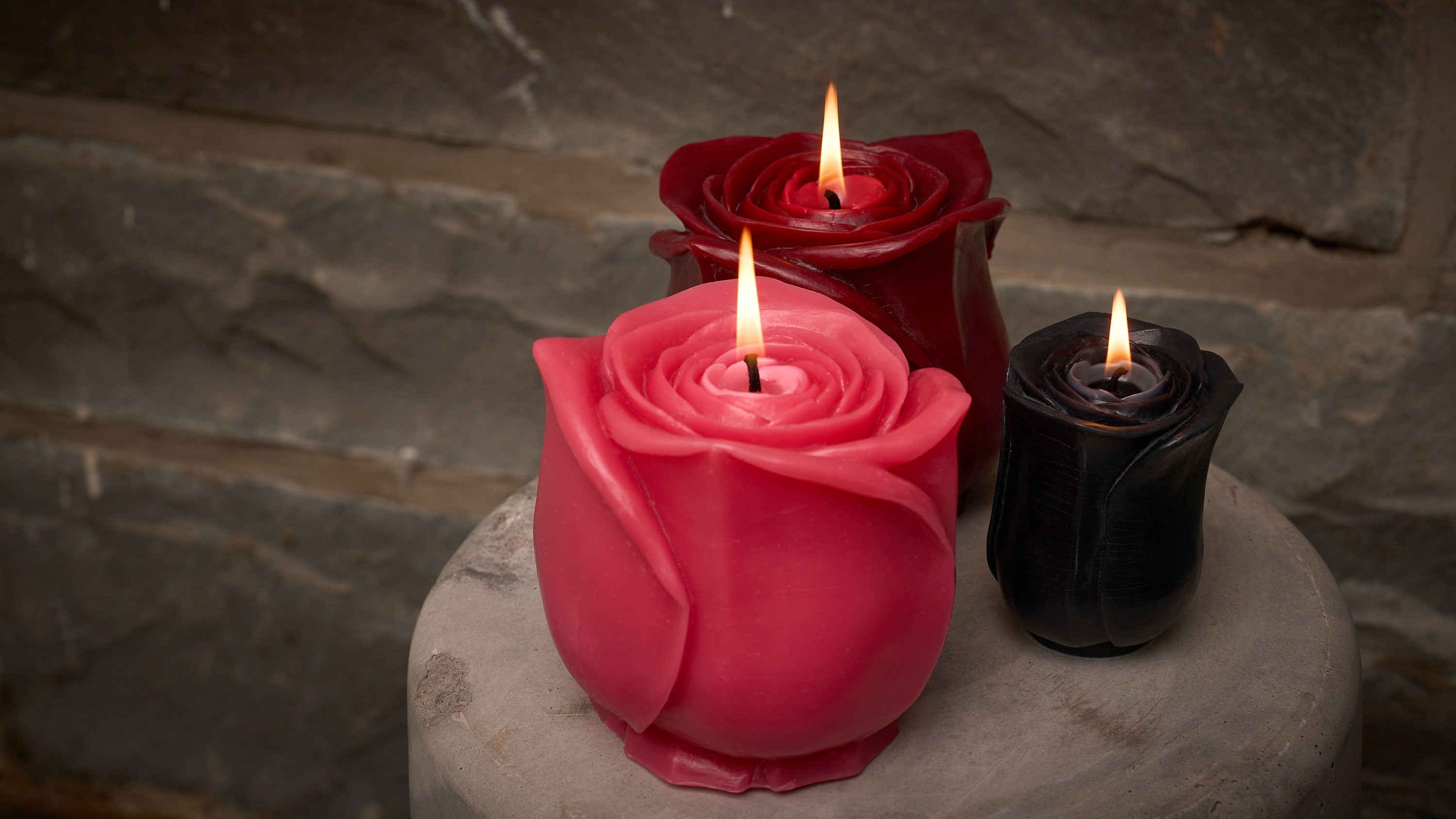 Rose candles pink, black, red lit