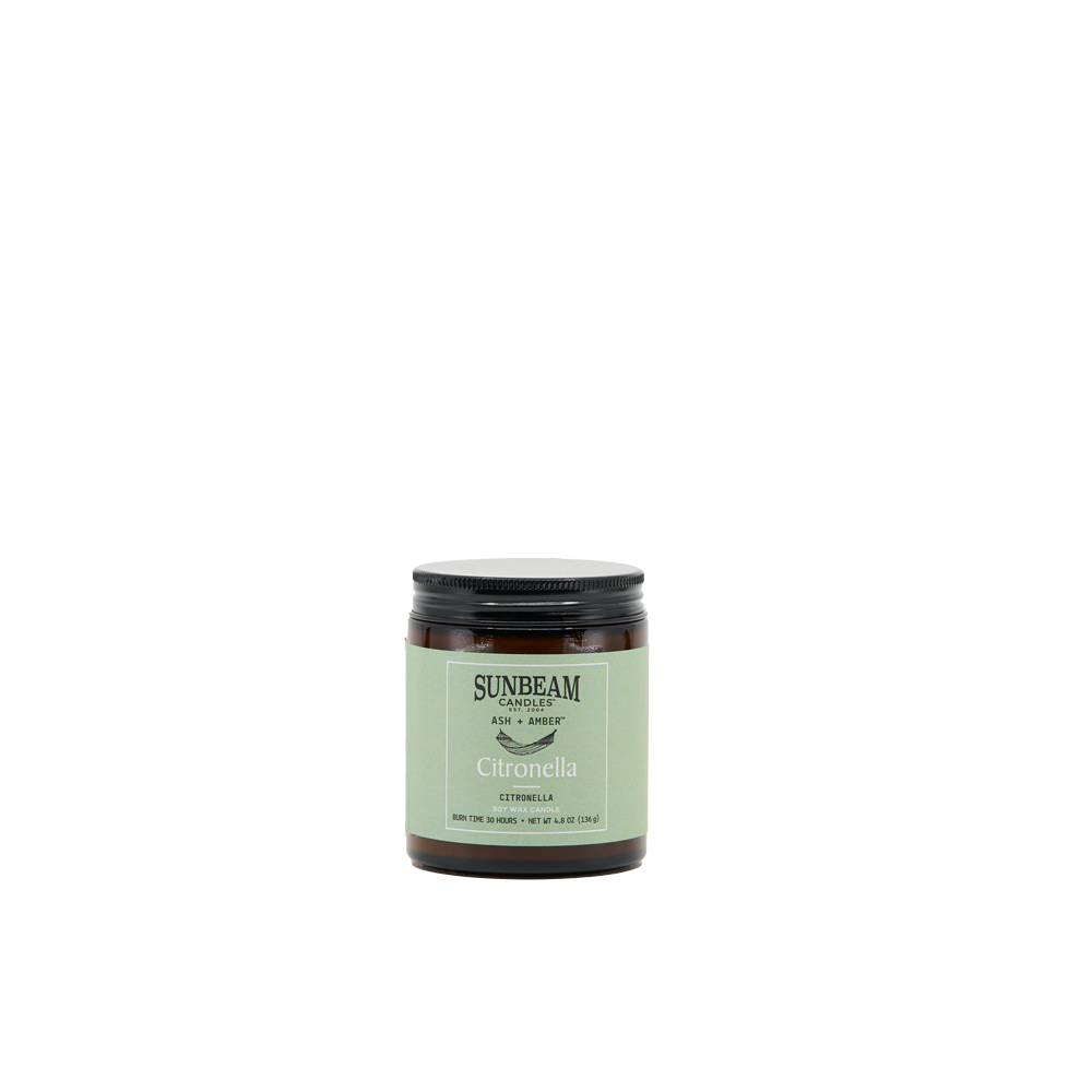 Sunbeam Candles Ash + Amber Summer Scent Citronella soy wax jar candle with a white background