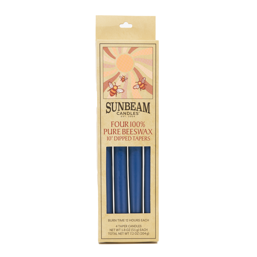 2-pair box of Sunbeam Candles 10" Dipped Beeswax Indigo Tapers on a white background