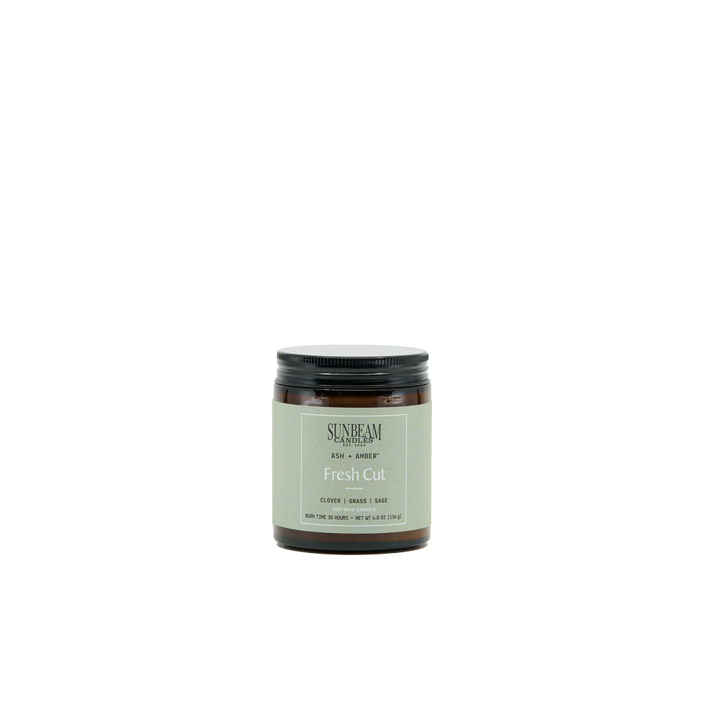 Sunbeam Candles Ash + Amber Fresh Cut Soy Wax jar candle on a white background