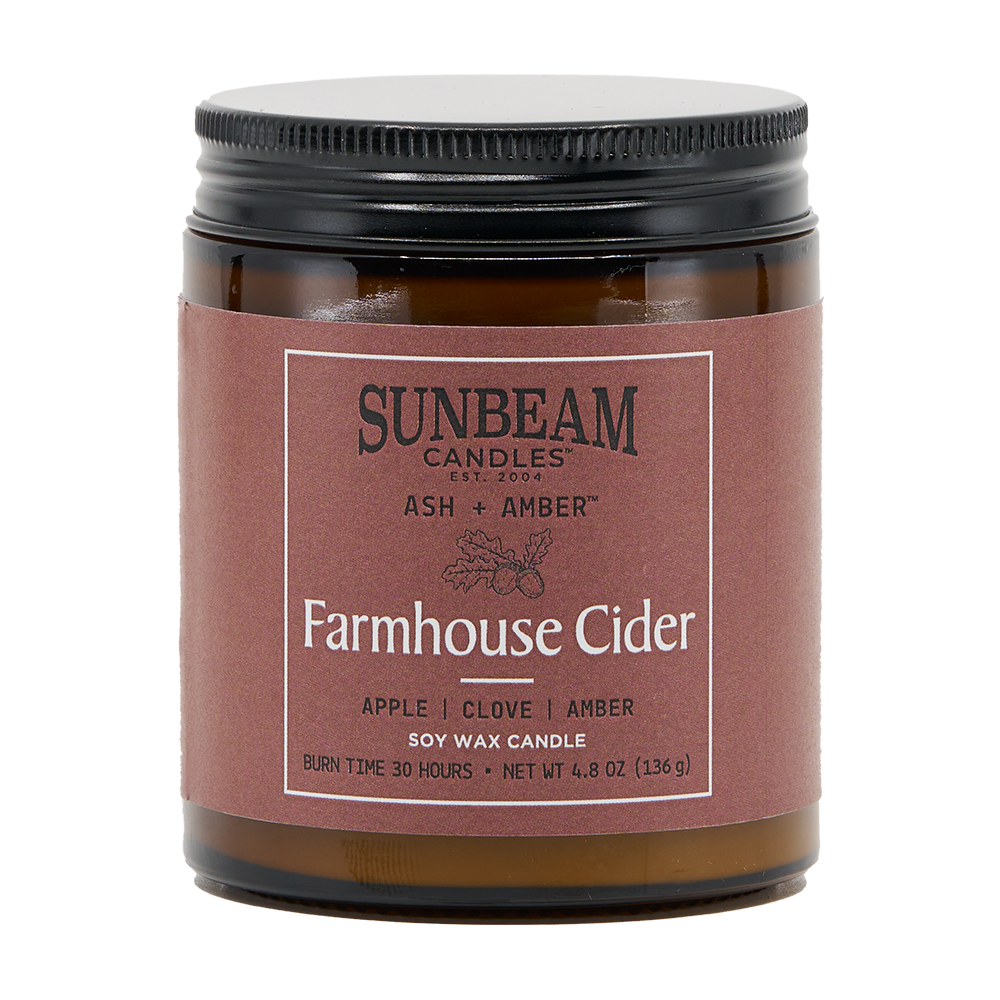 Sunbeam Candles Farmhouse Cider candle with a brown label on a white background