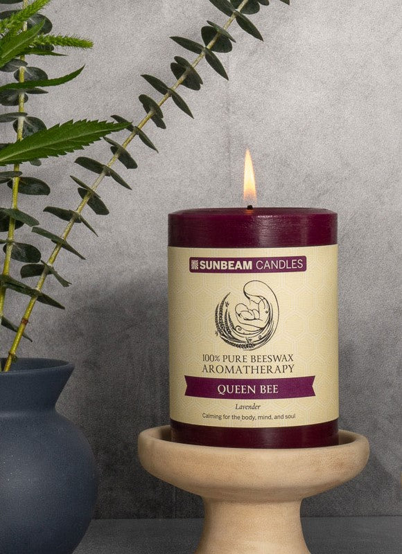 Lit Queen Bee aromatherapy 3x4 pillar on stand