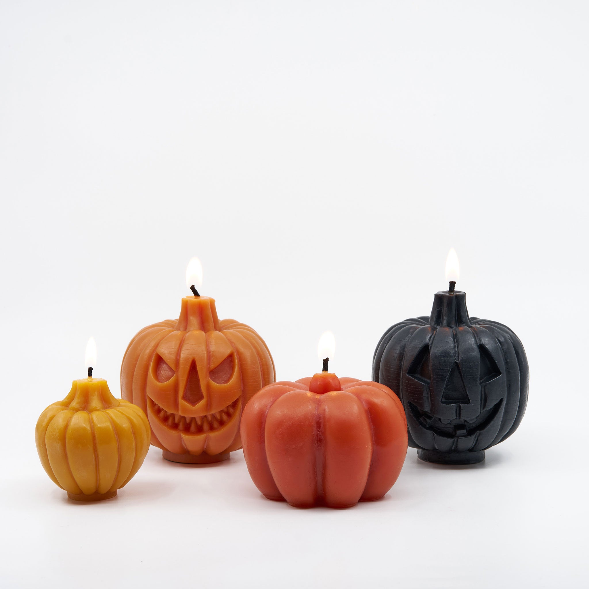 Natural-black-Handcrafted-non-toxic-Unscented-100%-Beeswax-Candle-emergency-highest-rated-long-burning-carved-sculpted-jack-o-lantern-pumpkin-halloween-unique-trending-home-gifts-fall-spooky-pumpkins