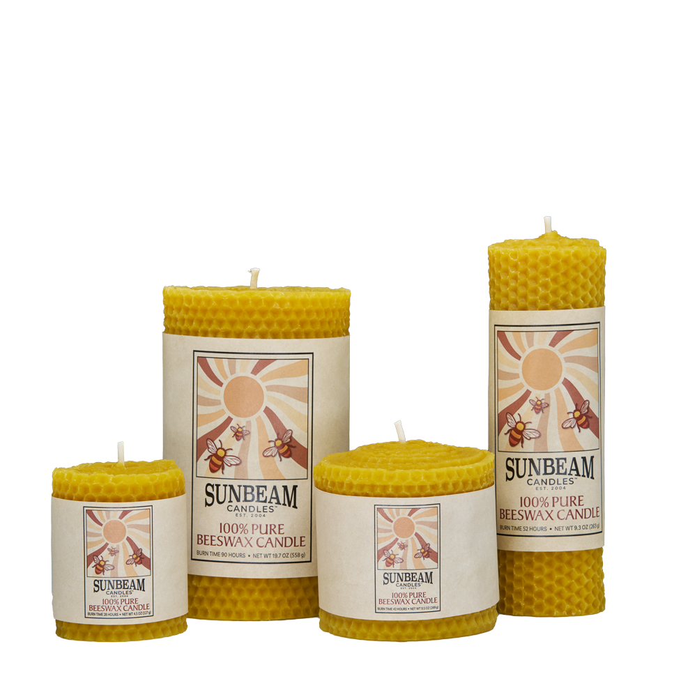 Four Sunbeam Candles Beeswax Honeycomb Pillars with a white background.