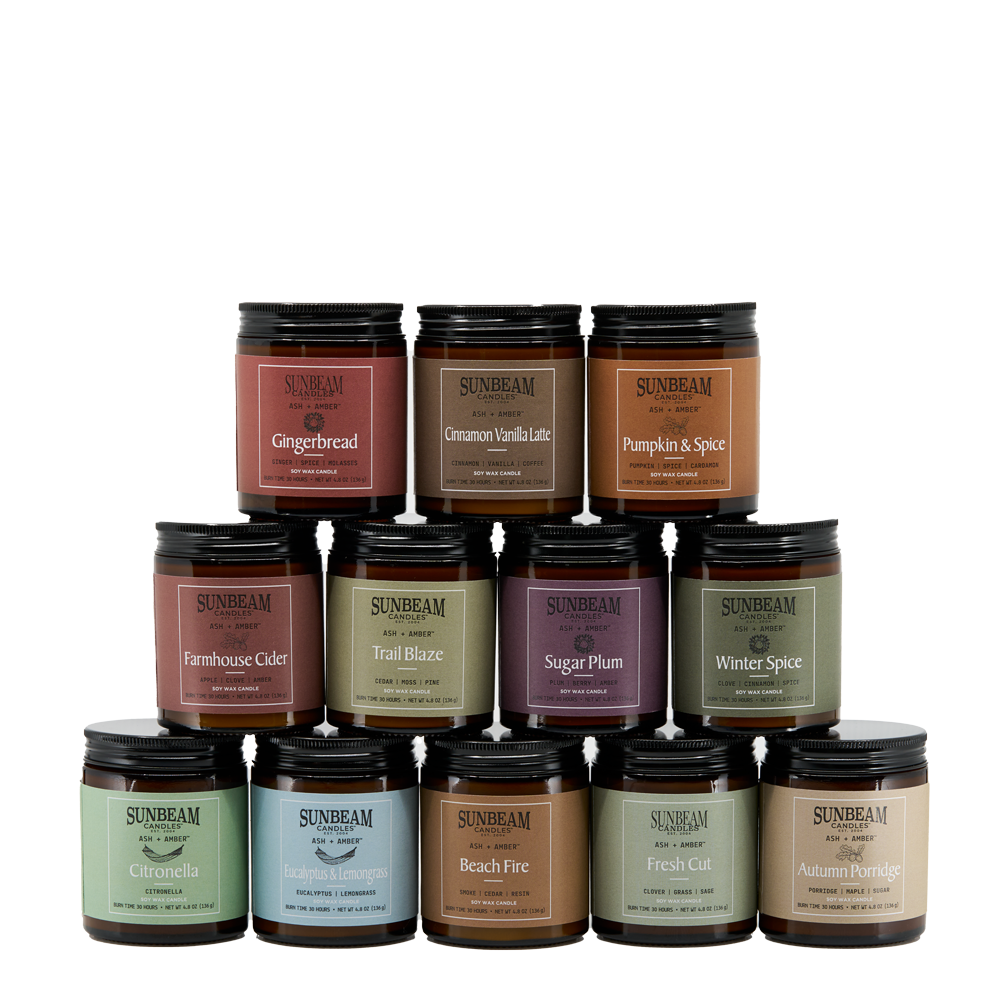 Sunbeam Candles Ash + Amber Soy Wax jar candle collection stacked on a white background 