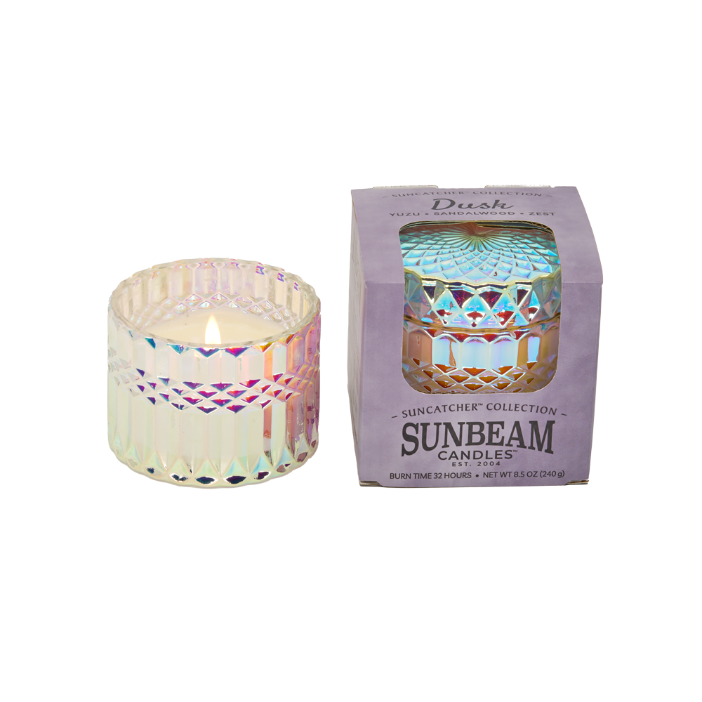 Sunbeam Candles SunCatcher Dusk scent apricot, coconut & soy wax iridescent container candle in box with lit container next to it with white background